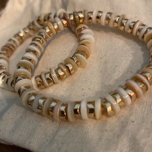 715. One Handcrafted White Shell & Gold Colour Beaded Stretchy Bracelets